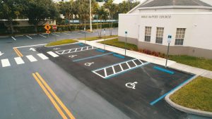 Parking lot striping and ADA compliant handicap parking spaces done by 3-D Paving in Coral Springs, FL at a church in Poampano Beach, FL