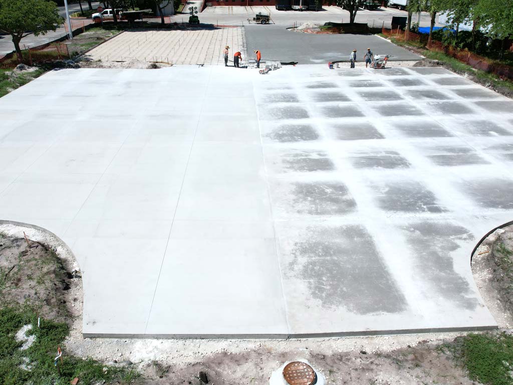 Concrete slab being pictured after pour and cure showing expansion saw cuts by 3-D Paving and Sealcoating.