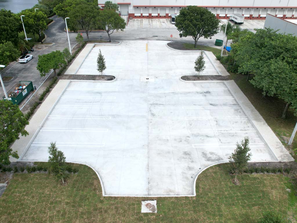 Concrete Parking Lot newly installed at the LOWE'S facility in Pompano Beach, FL. Looking for a Parking Lot contractor near me? Call the Parking Lot experts at 3-D Paving in Coral Springs, FL.