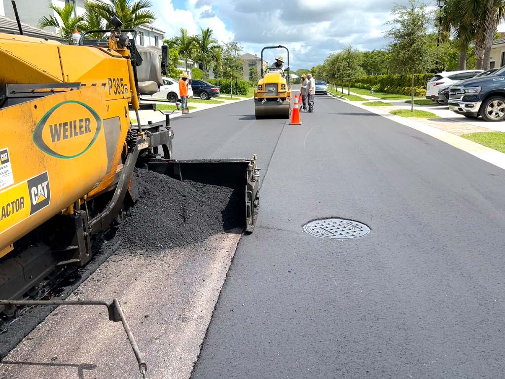 Asphalt services near me, paving contractor in South Florida, 3-D Paving and Sealcoating Paves a residential street at the Palm Aire ressidential community in Pompano Beach, FL.