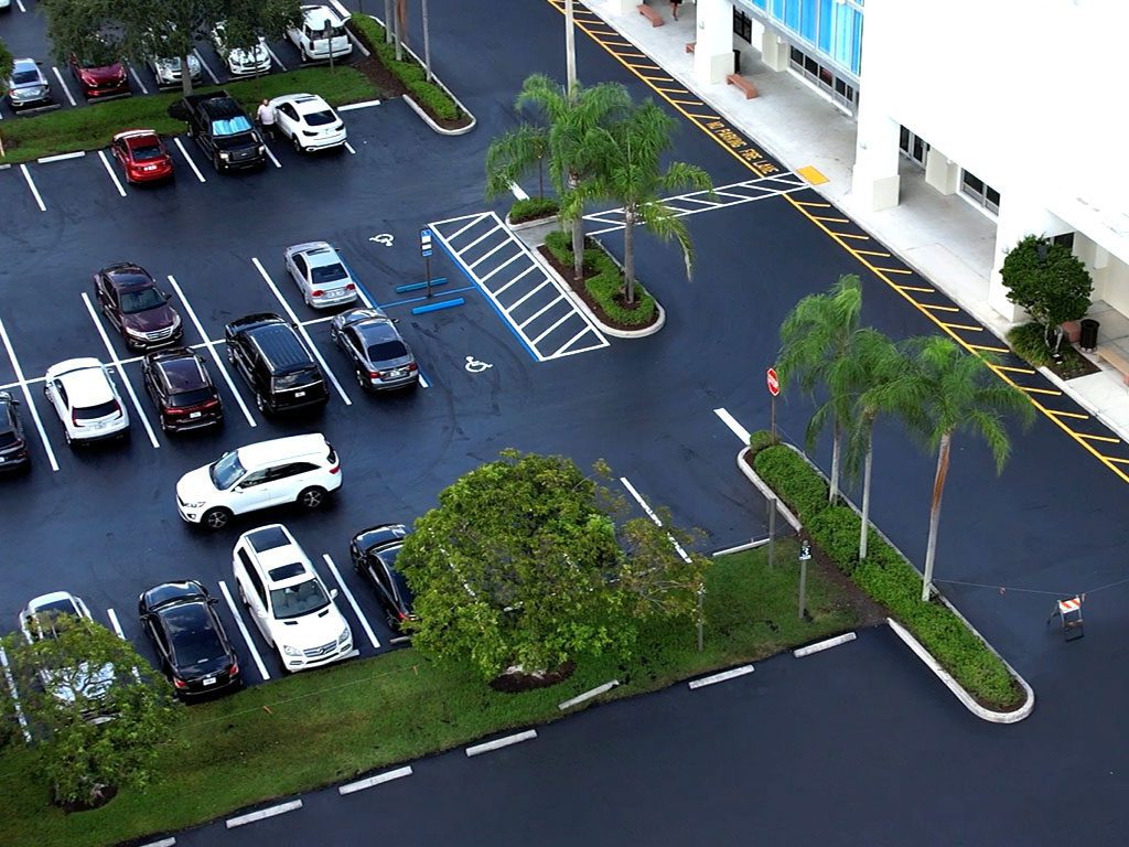 Complete Parking Lot refurbishment done by 3-D Paving at the Tower Shops complex in Davie, FL.