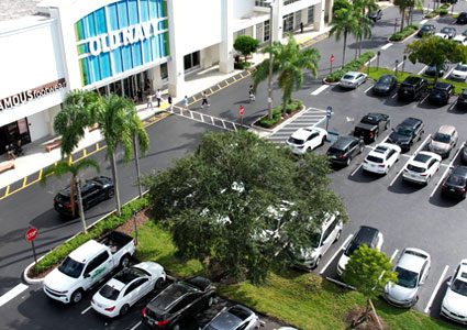 Asphalt parking lot maintenance project at a shopping center in South Florida. Paving contractor near me in Fort Lauderdale.