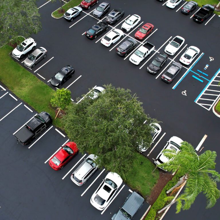 Overhead view of newly repaired asphalt parking lot. Parking lot repair experts.
