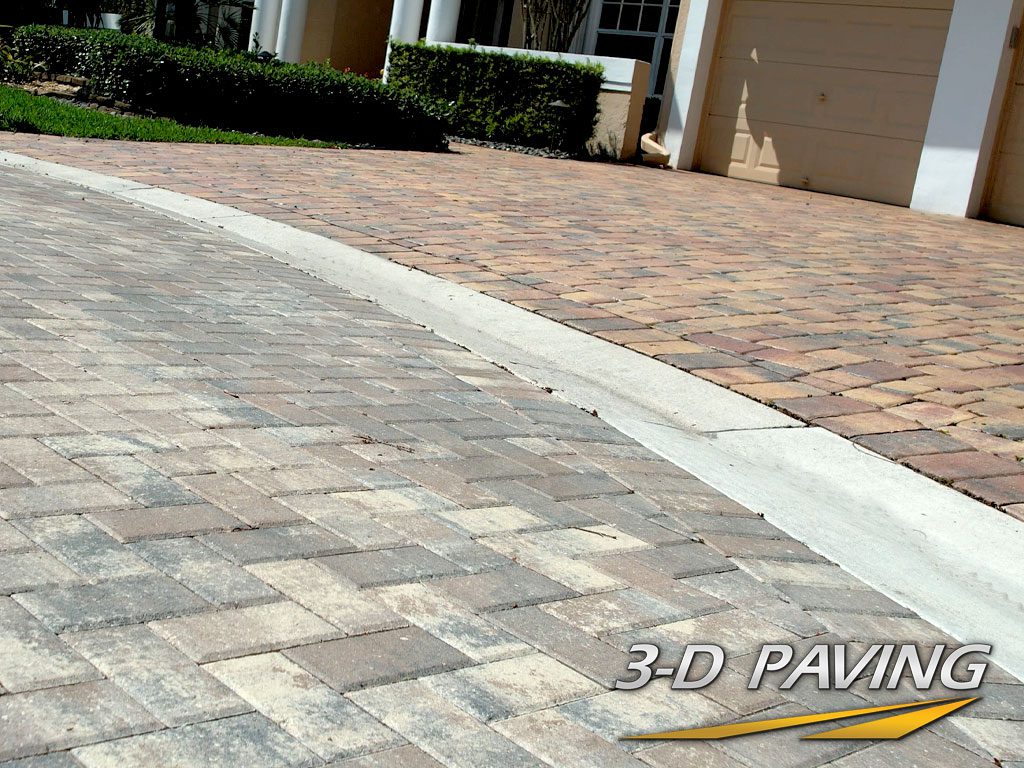 Commercial Driveway and roundabout done with paver brick or brick pavers in 2 different colors and patterns. Installed by South Florida's commercial paving experts, 3-D Paving and Sealcoating based out of Coral Springs, FL.