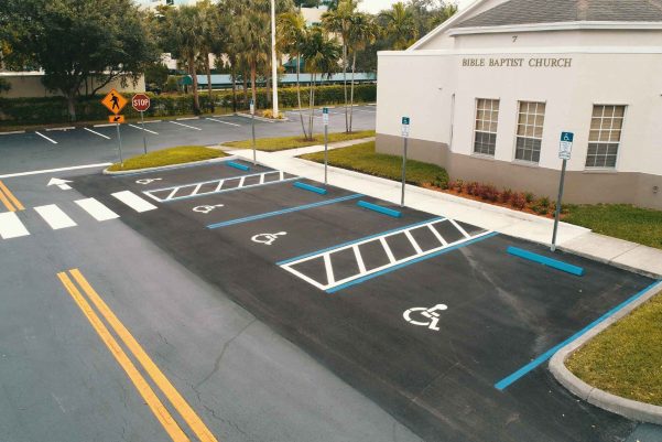 Parking lot striping and ADA compliant handicap parking spaces done by 3-D Paving in Coral Springs, FL at a church in Poampano Beach, FL